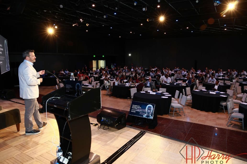 Glenn presenting a keynote to a packed ballroom at CFOLC West 2024