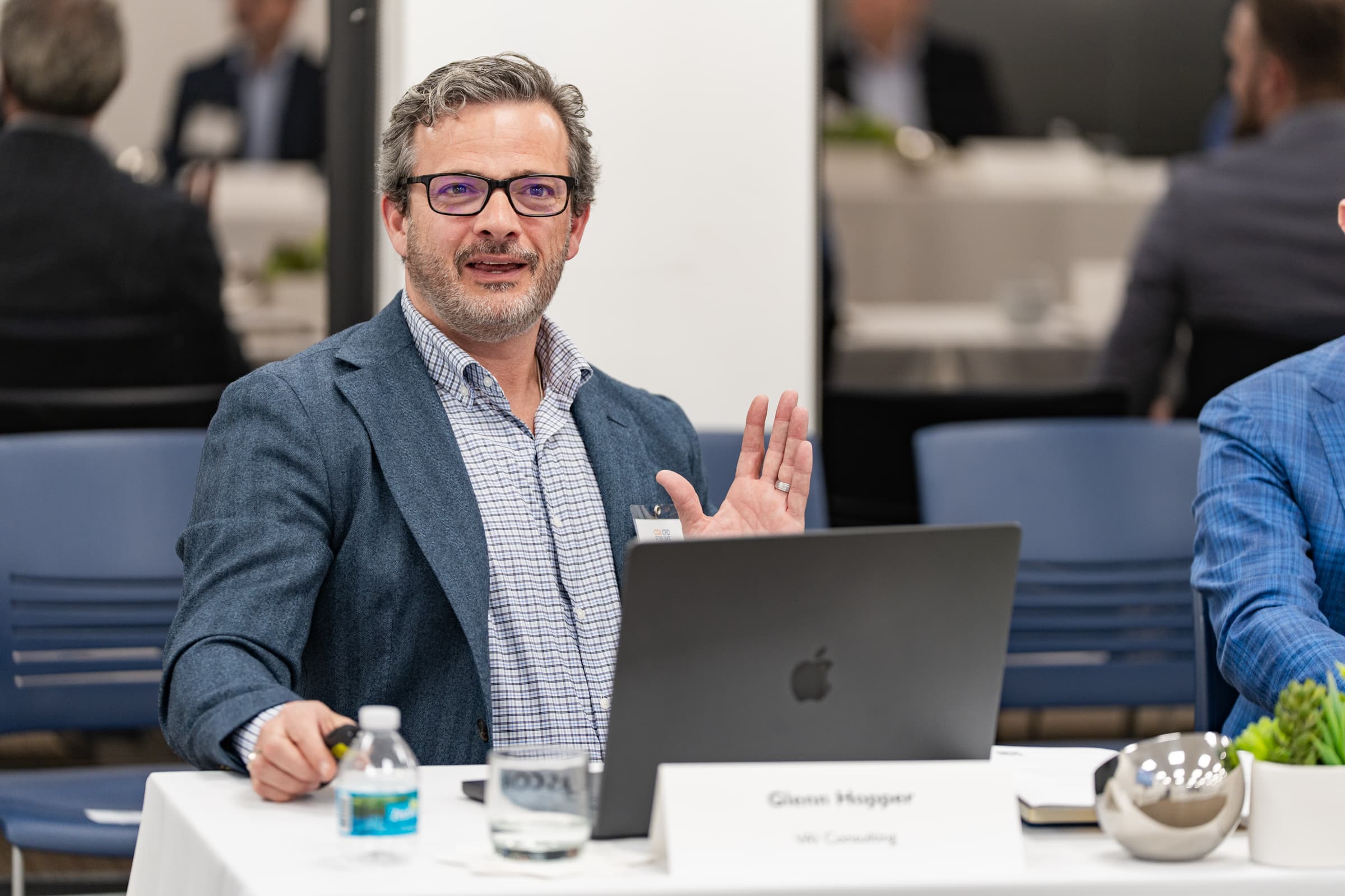 Glenn leading a roundtable discussion at a G3 Consulting event